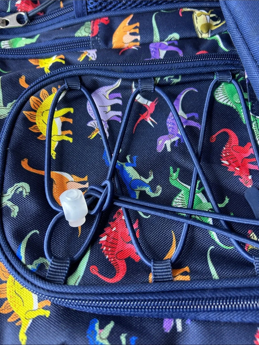 Tommy Bahama Kids Navy Backpack with Colorful Dinosaur Print